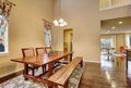 Dining area with rustic wooden table and bench Royalty Free Stock Photo