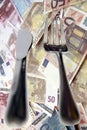 Dining out knife and fork isolated in money Royalty Free Stock Photo