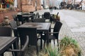 Dining outdoors. Outdoor street cafe tables ready for service. Empty cafe terrace with table and chair. Table of outdoor Royalty Free Stock Photo