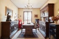 Dining room with antiquities in home interior Royalty Free Stock Photo