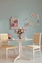 Dining room interior with flowers decorative plates Royalty Free Stock Photo