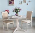 Dining room interior with flowers decorative plates