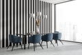 Dining room interior with table and chairs, black and white stripes wall Royalty Free Stock Photo