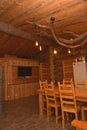 Dining room interior of a wooden house Royalty Free Stock Photo