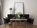 Dining room mockup with luxury black dining set, black gold dining table, and blank frame Royalty Free Stock Photo