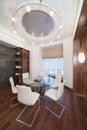 Dining room with a round glass table