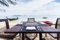 Dining table on the beach Royalty Free Stock Photo