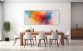 a dining table and chairs inside of a room with a painting on the wall Royalty Free Stock Photo