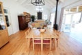 Dining Table With Chairs And Seating Area In Stylish And Contemporary Open Plan Empty Home Royalty Free Stock Photo