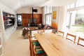 Dining Table With Chairs And Seating Area In Stylish And Contemporary Open Plan Empty Home