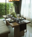Dining table and comfortable chairs in modern home