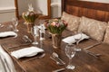 Dining table laid for dinner in pub, restaurant, hotel or home