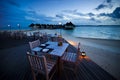 Dining table at the outdoor beach restaurant Royalty Free Stock Photo