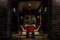 Dining table with red chair and red roses in retro restaurant