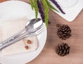 Dining table setting white plate with flower, wineglass, vintage Royalty Free Stock Photo