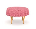 Dining table with tablecloth.