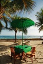 Dining Table at tropical beach Royalty Free Stock Photo