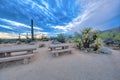 Dining tables on a campground near the field of catuses at Sabino Canyon State Park, Tucson, AZ