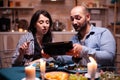 Dining together using tablet Royalty Free Stock Photo