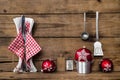 Dinner on christmas eve. Old wooden background with red white ch Royalty Free Stock Photo