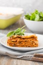 Dinner with classic lasagna bolognese with bÃÂ©chamel sauce parmesan cheese spinach