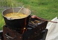 Dinner cooking on an open fire Royalty Free Stock Photo