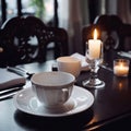 Dinner at a fancy restaurant. Elegant table setting. Cup of coffee. Luxury travel concept.