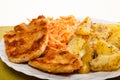 Dinner. Fried chicken roasted potatos carrot salad Royalty Free Stock Photo