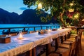 Dinner group table by Phi Phi beach at dawn