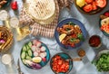 Dinner party table with grilled sausage, beer and different dish Royalty Free Stock Photo