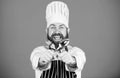 Dinner pause. Healthy food cooking. Chef man in hat. Secret taste recipe. Vegetarian. Mature chef with beard. Dieting Royalty Free Stock Photo