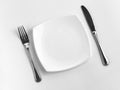 Dinner place for one person: plate, fork, knife