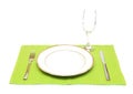 A dinner plate, knife, fork and wine glass Royalty Free Stock Photo