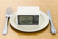 Dinner plate with microwave oven, 3D rendering Royalty Free Stock Photo