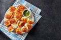 Dinner rolls with garlic sauce on a plate Royalty Free Stock Photo