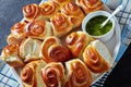 Dinner rolls with garlic sauce on a plate Royalty Free Stock Photo