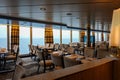 A dinner seating area on a cruise ship
