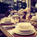 Dinner set up - Image. Table served for luxury dinner party with white plates, napkins, glasses, candles Royalty Free Stock Photo