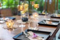 Dinner set on the wood table with long wine glass Royalty Free Stock Photo