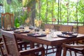 Dinner set on the wood table with long wine glass Royalty Free Stock Photo