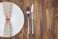 Dinner setting, Knife, fork, napkin and dinner plate Royalty Free Stock Photo