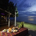 Dinner on sunset at beach in Thailand Royalty Free Stock Photo