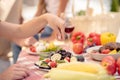 Close up picture of dinner table with lots of vegetables