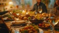 A dinner table set with various dishes and wine, with people dining Royalty Free Stock Photo