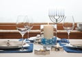 Dinner table setting decorated for Hanukkah. Traditional Jewish holidays home celebrations decor