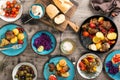 Dinner table with variety food, top view