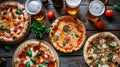 Dinner table with various delicious food. Italian pizza, beer, top view Royalty Free Stock Photo