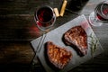 Dinner for two with steaks and red wine Royalty Free Stock Photo