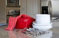 Dinnertime - casserole, plates in modern kitchen Royalty Free Stock Photo