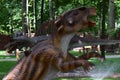 Dinosaur statue in the forest park in nature for background. Wuerlosaurus - Early Jurassic 155-150 million years ago